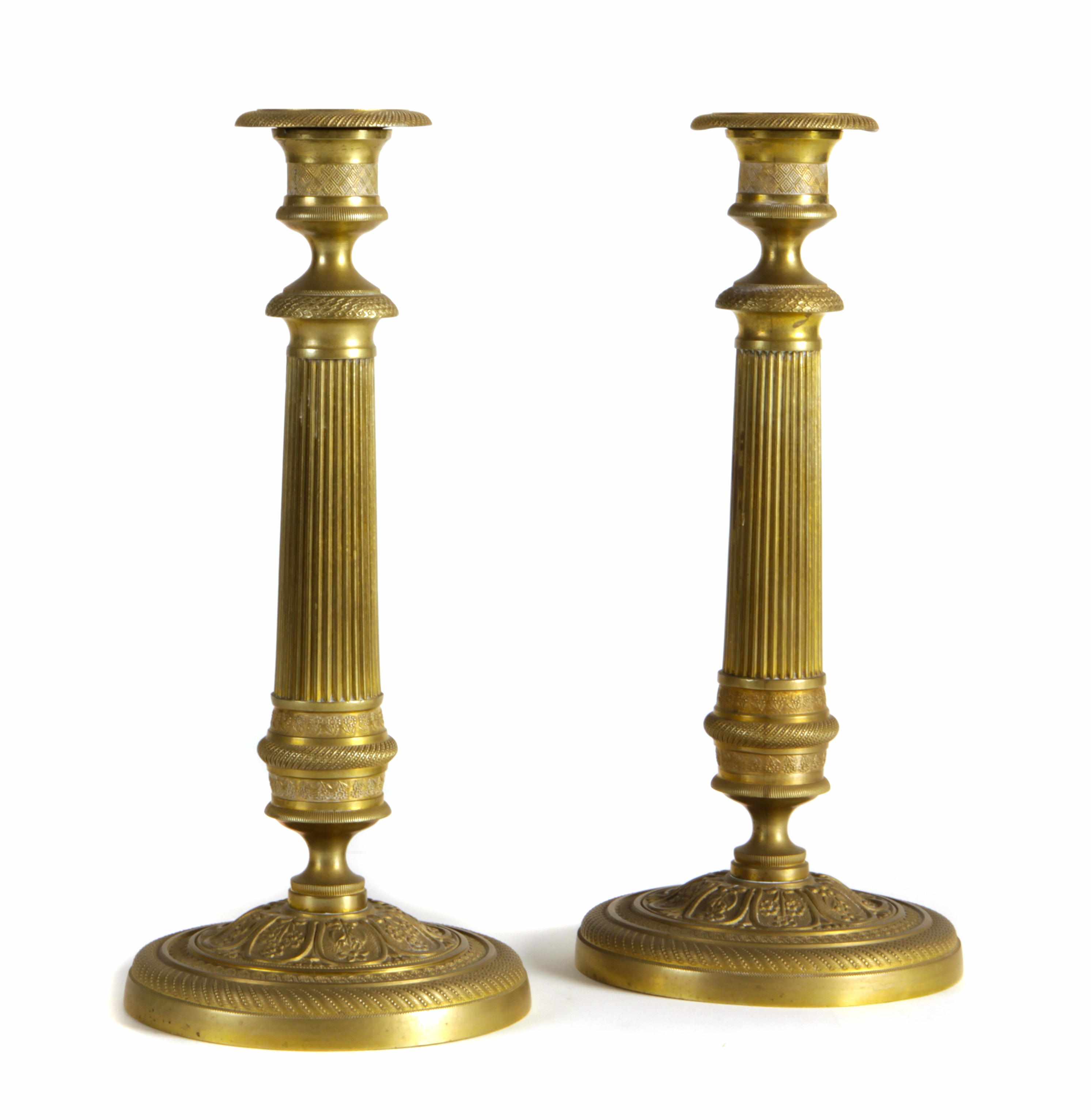 Appraisal: A pair of Empire style gilt bronze candlesticks height in