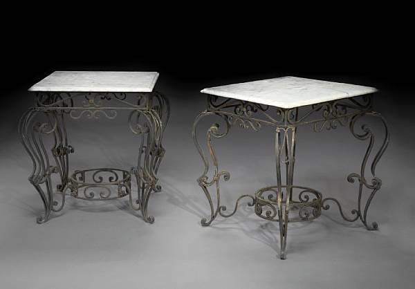 Appraisal: A pair of Baroque style wrought iron and marble tables