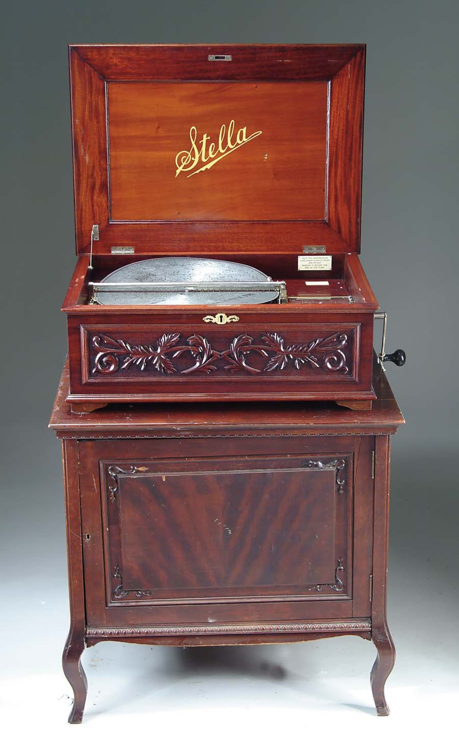 Appraisal: STELLA DISC PLAYING MUSIC BOX W STAND Exceptional Swiss music