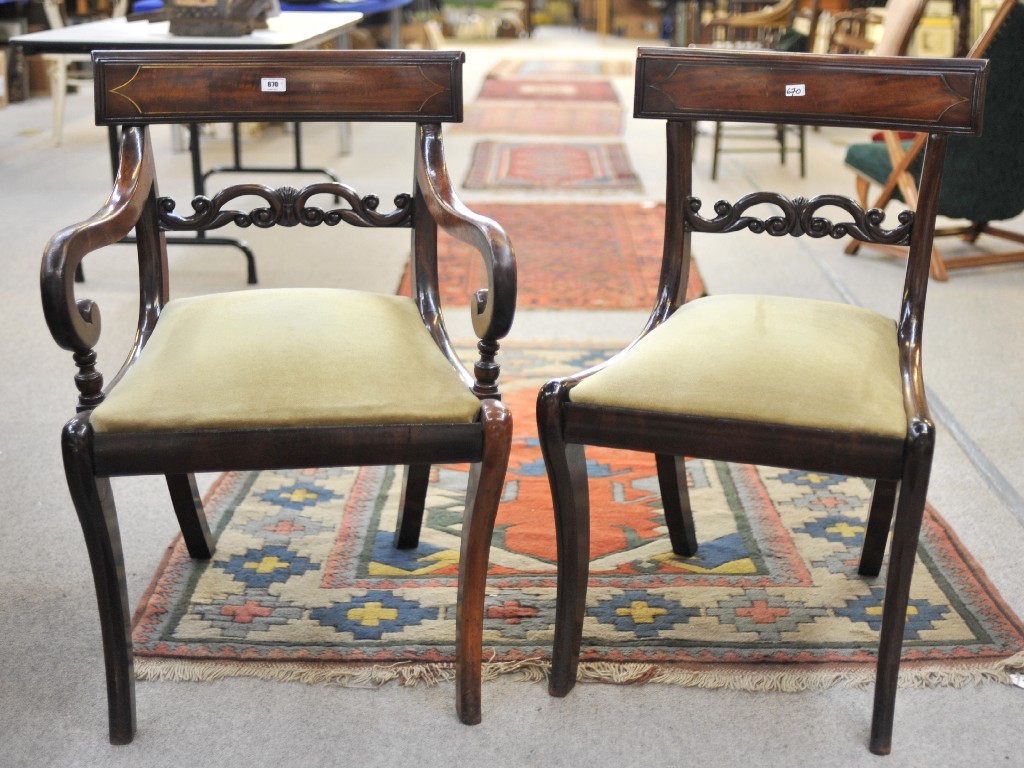 Appraisal: Regency mahogany elbow chair with matching side chair