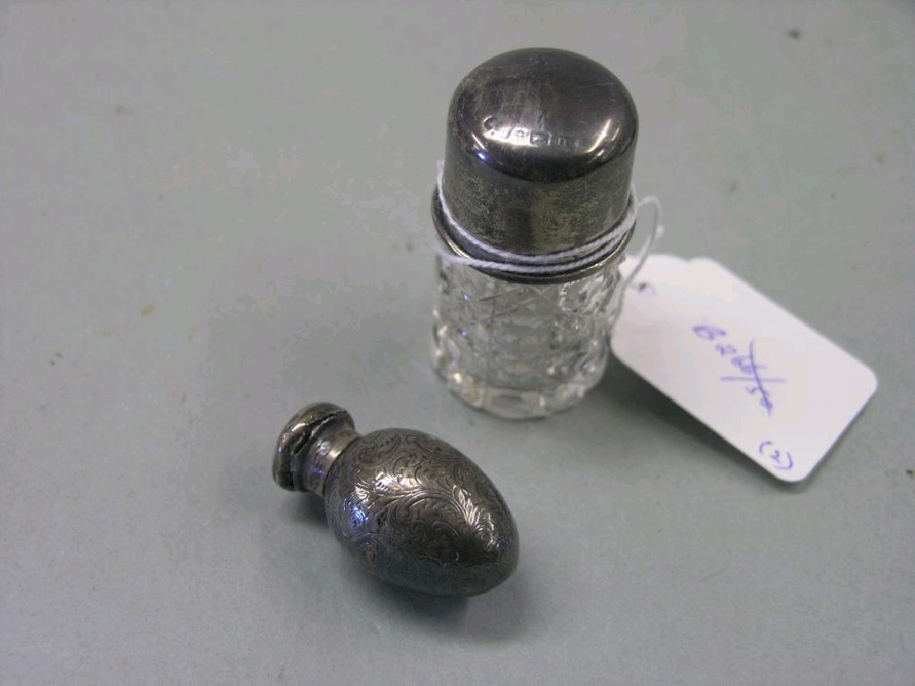 Appraisal: A small engraved silver scent bottle egg-shape with screw cover