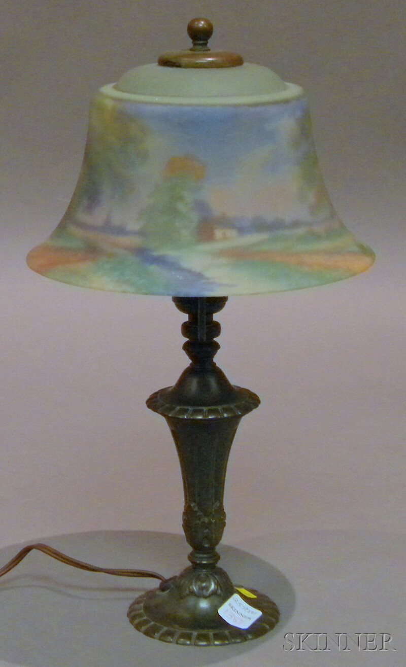 Appraisal: Reverse-painted Glass and Patinated Metal Boudoir Lamp The Pairpoint Lamp