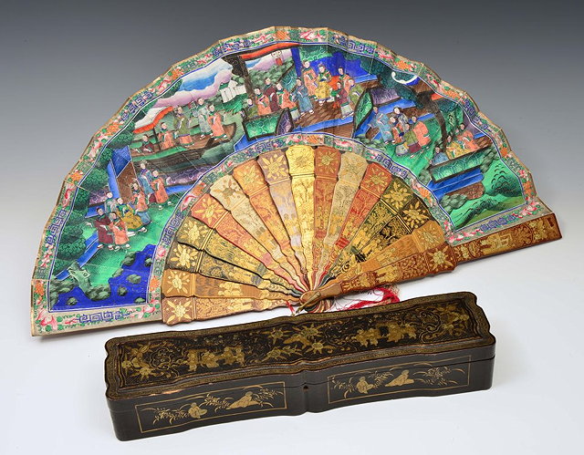 Appraisal: A CHINESE LACQUER AND PAPER FAN decorated with terrace scene