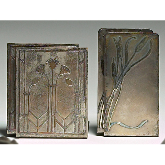 Appraisal: Heintz bookends pair sterling on bronze applied design original silver