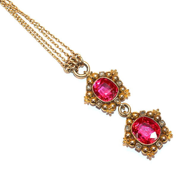 Appraisal: A CT GOLD NECKLACE with attached pendant set two synthetic