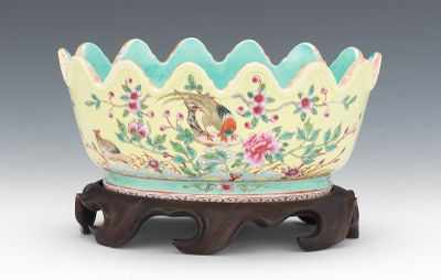 Appraisal: A Chinese Porcelain Bowl with Carved Wood Stand Oval form