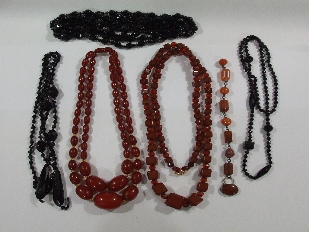 Appraisal: Lot comprising a double strand of cherry amber beads three