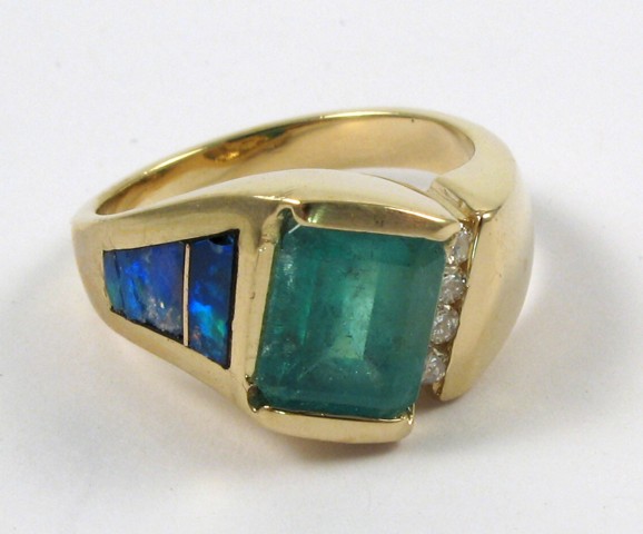 Appraisal: EMERALD OPAL AND DIAMOND RING k yellow gold set with