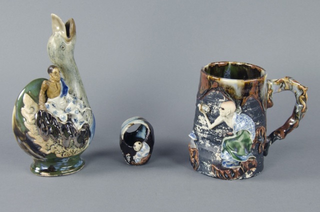 Appraisal: Three Pieces Sumida WareIncluding cormorant-form vase with elder seated on