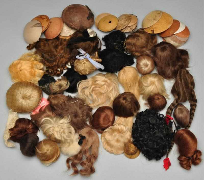 Appraisal: Lot of Wigs and Pates for Antique Dolls Description Mostly