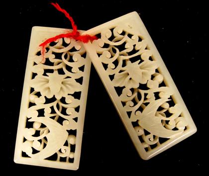 Appraisal: Pair of Chinese white jade openwork plaquesRectangular frames enclosing Fu