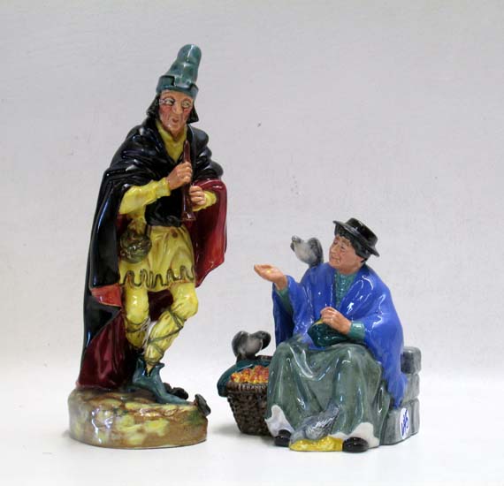 Appraisal: TWO ROYAL DOULTON PORCELAIN FIGURINES The Pied Piper HN H