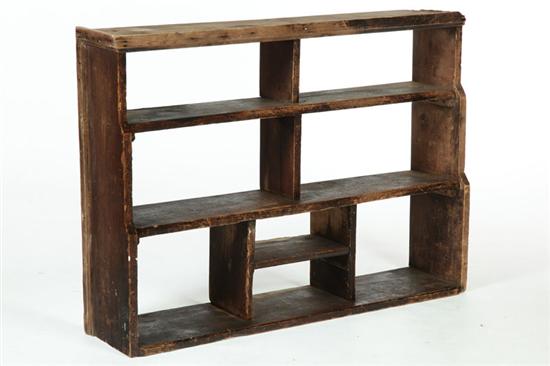 Appraisal: HANGING SHELF American th century poplar Divided shelves retaining its