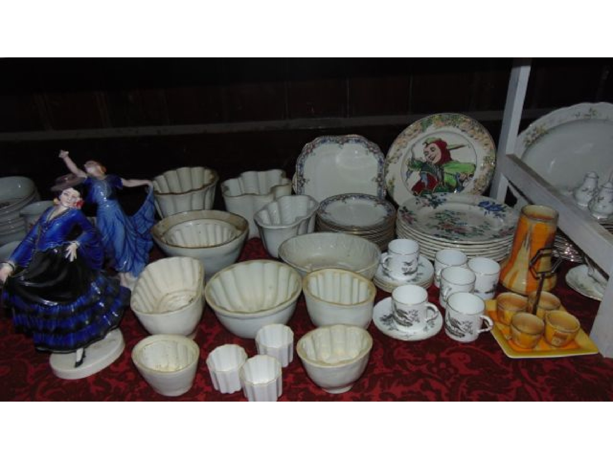 Appraisal: A quantity of various jelly moulds with moulded decoration including