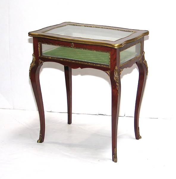 Appraisal: A pair of Louis XV style mahogany vitrine tables mid