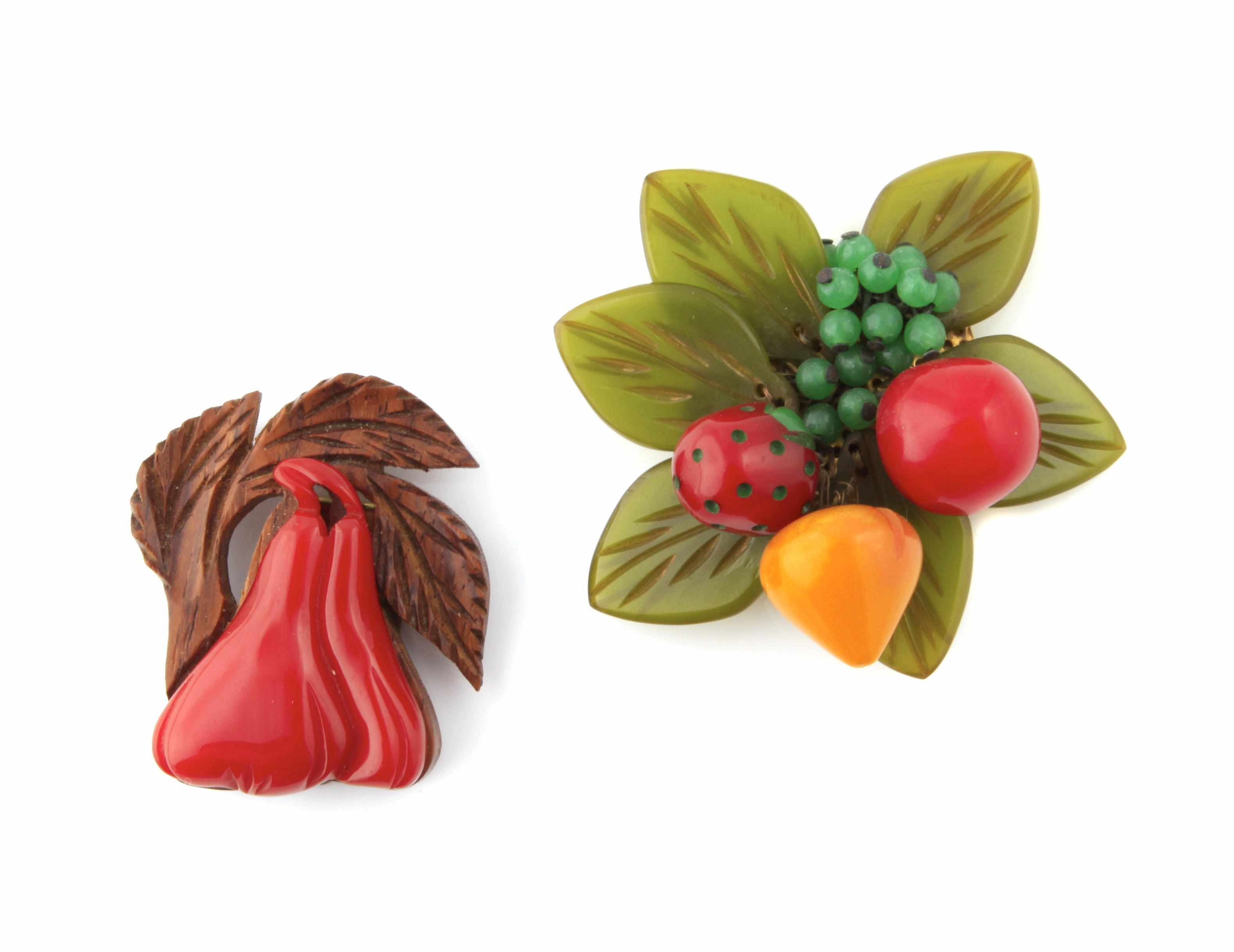 Appraisal: Two Bakelite fruit clips