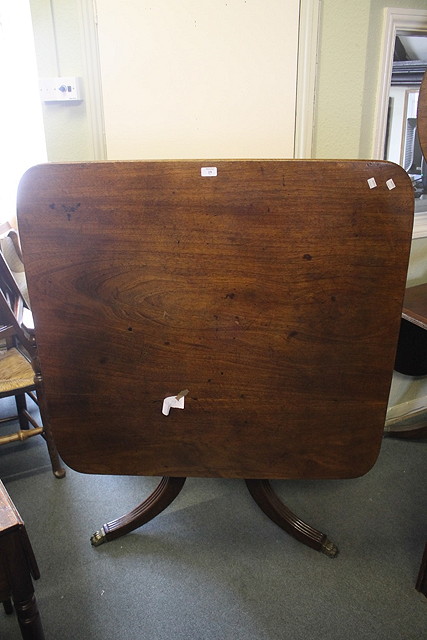 Appraisal: A REGENCY MAHOGANY TILT TOP BREAKFAST TABLE the turned pedestal