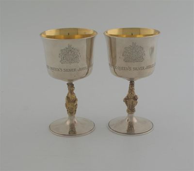 Appraisal: Two limited edition parcel-gilt goblets commemorating the Queen's Silver Jubilee