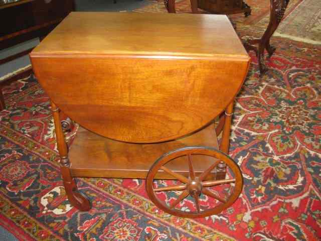 Appraisal: Mahogany Tea Cart drop sides handle with drawer