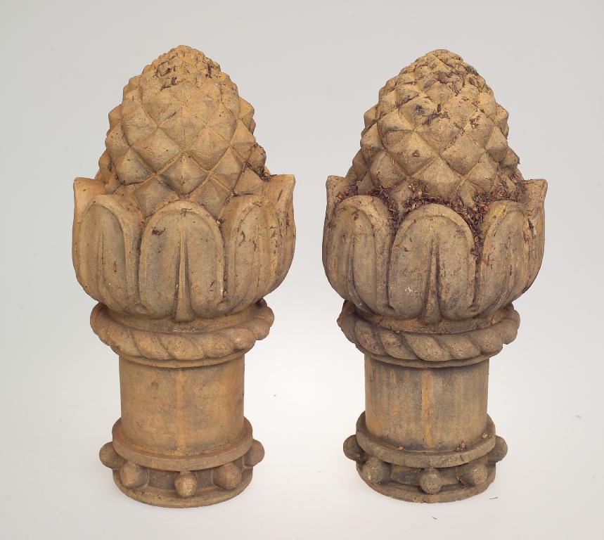 Appraisal: PAIR OF th CENTURY TERRACOTTA PINEAPPLE POST FINIALS each on