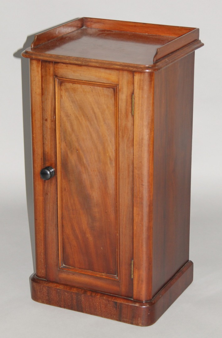 Appraisal: A thC Victorian mahogany pot cupboard the D-end top with