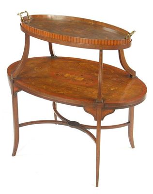 Appraisal: A late Victorian mahogany and marquetry two tier oval etagere