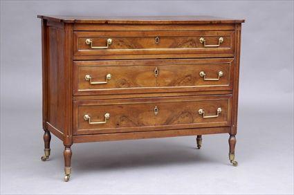 Appraisal: PROVINCIAL LOUIS XVI WALNUT COMMODE The rectangular overhanging top with