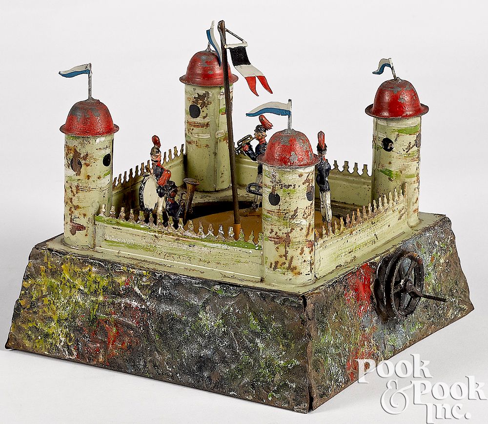 Appraisal: Castle with soldiers steam toy accessory Painted tin castle with