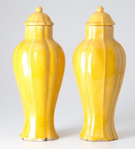 Appraisal: MANUEL JALANIVICH Pair of covered urns in a yellow crackled