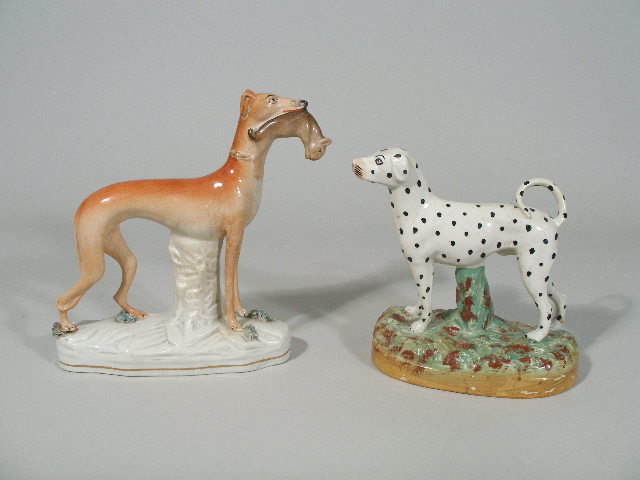 Appraisal: Two Staffordshire Dog Figurals th c the first a whippet