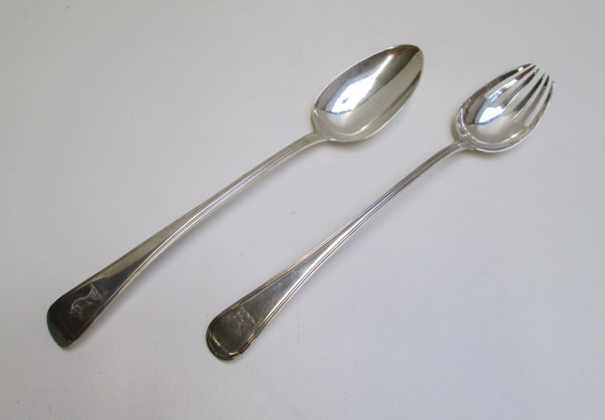 Appraisal: TWO GEORGE III STERLING SILVER STUFFING SPOONS one hallmarked British