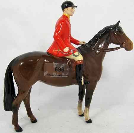 Appraisal: Beswick Model of a Huntsman on Brown Horse