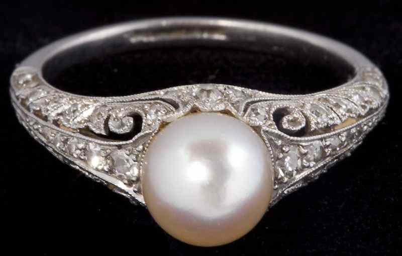 Appraisal: Platinum Pearl and Diamond Ring Spaulding Co centering on one