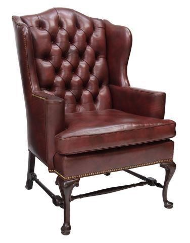 Appraisal: Queen Anne style wingback leather armchair Hancock and Moore late