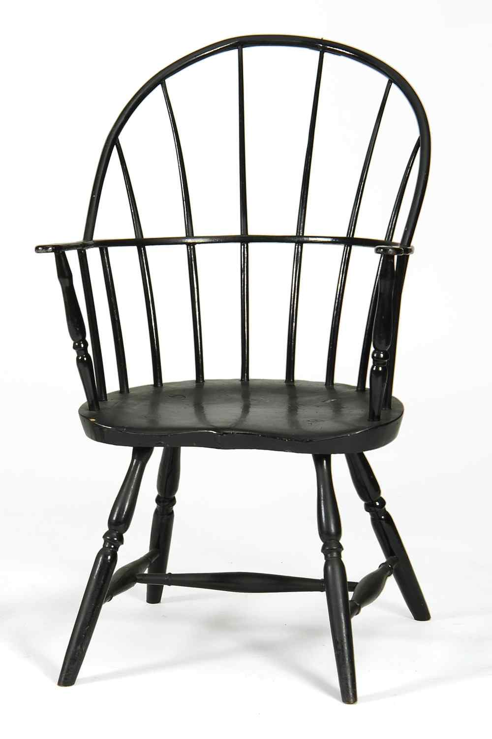 Appraisal: ANTIQUE AMERICAN BOWBACK WINDSOR ARMCHAIRCirca In black paint Shaped arms