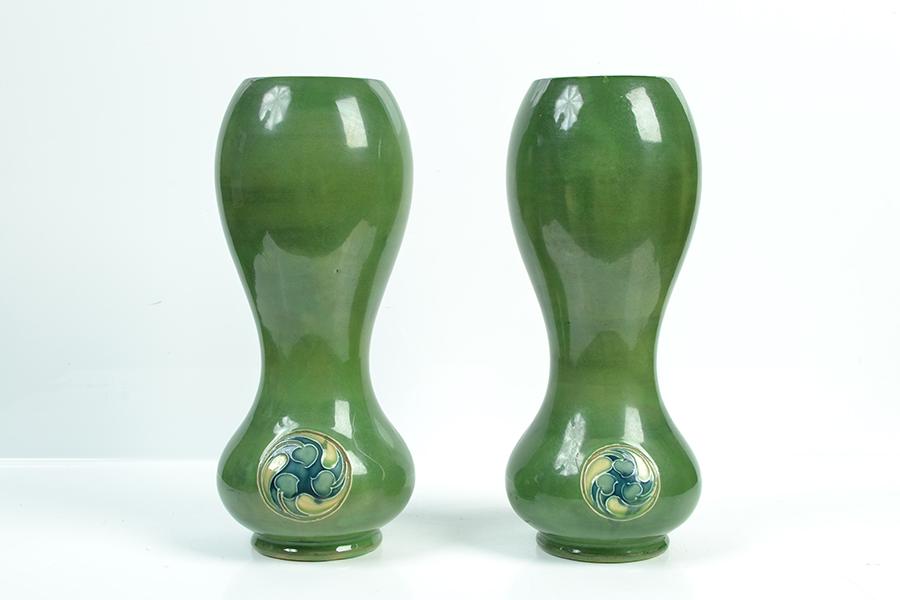 Appraisal: A PAIR OF MOORCROFT FLAMMINIAN WARE VASES double gourded in