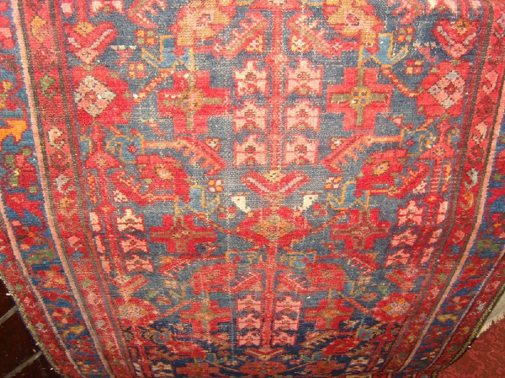 Appraisal: An eastern wool runner with geometric and stylised floral decoration