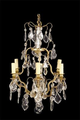 Appraisal: A gilt metal and glass six light electrolier with scrolling