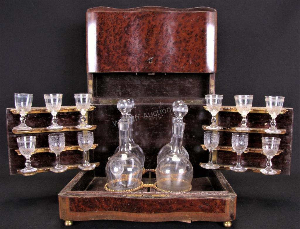 Appraisal: Antique Wooden Tantalus Liqueur Set featuring a Birdseye maple veneered