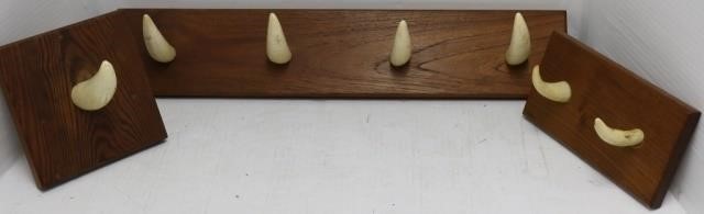 Appraisal: THREE TH C WALL MOUNTED COAT PEGS MADE FROMSPERM WHALE'S