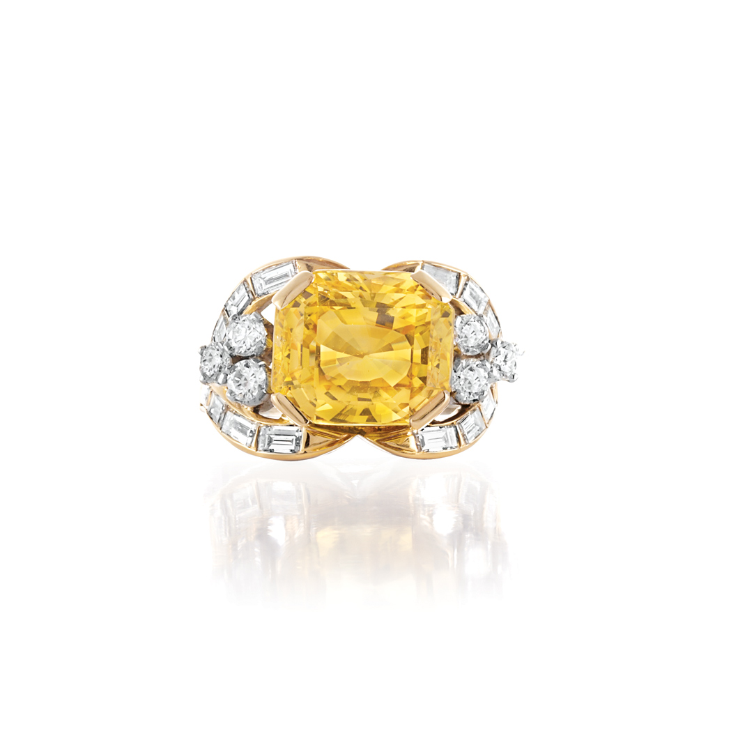 Appraisal: Platinum Gold Yellow Sapphire and Diamond Ring Centering one octagonal