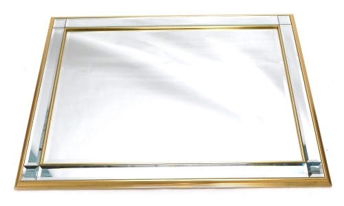 Appraisal: A modern rectangular wall mirror with bevel glass in sections