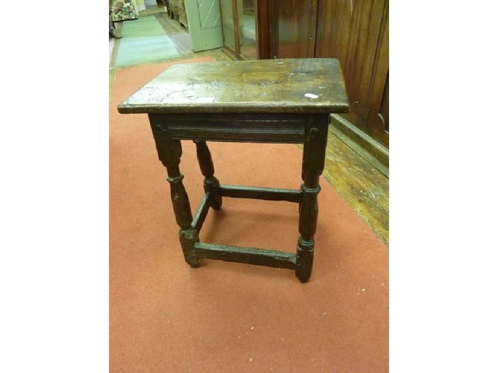 Appraisal: A Georgian oak joint stool with moulded frieze raised on