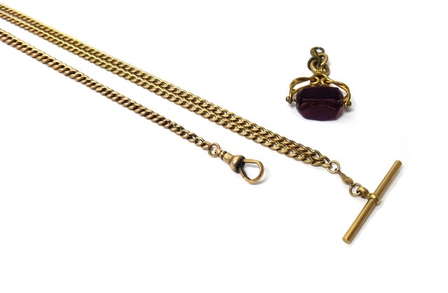 Appraisal: A ct gold faceted curb link watch Albert chain fitted