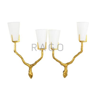 Appraisal: FELIX AGOSTINI - Pair of sconces France s Gilt bronze