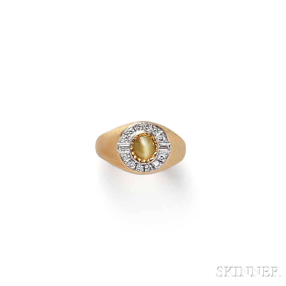 Appraisal: kt Gold Cat's-eye Chrysoberyl and Diamond Ring centering a cabochon