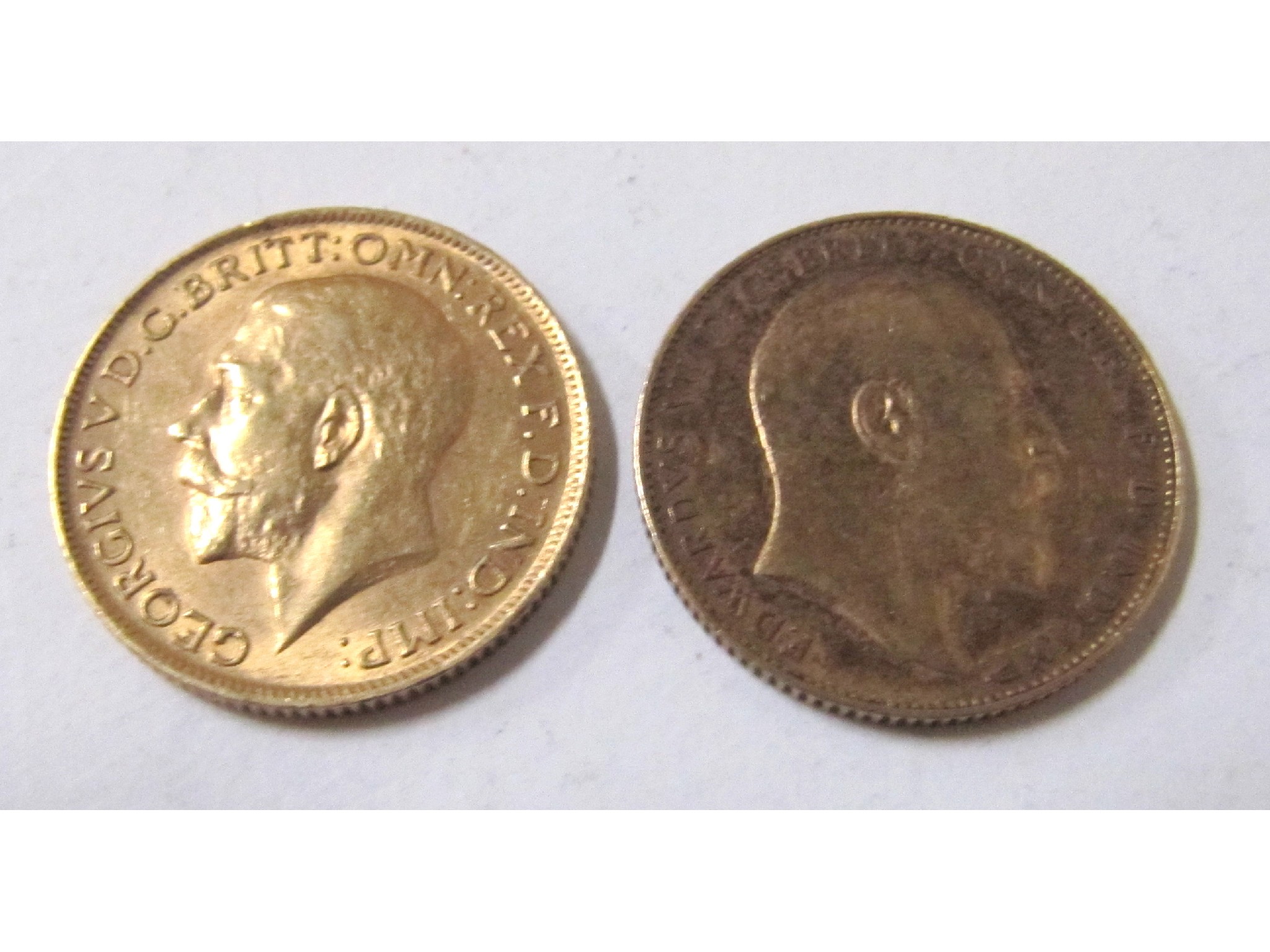 Appraisal: Edward VII gold sovereign darkly toned fine George V gold