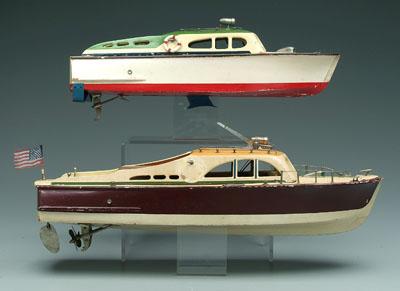 Appraisal: Two battery operated cabin cruisers one wooden kit built with