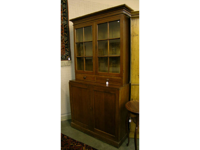 Appraisal: Antique combination cupboard consisting of cherry top cabinet with glass