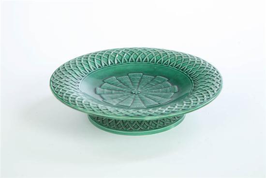 Appraisal: MINTON MAJOLICA CAKE SERVER Footed green server in a basket